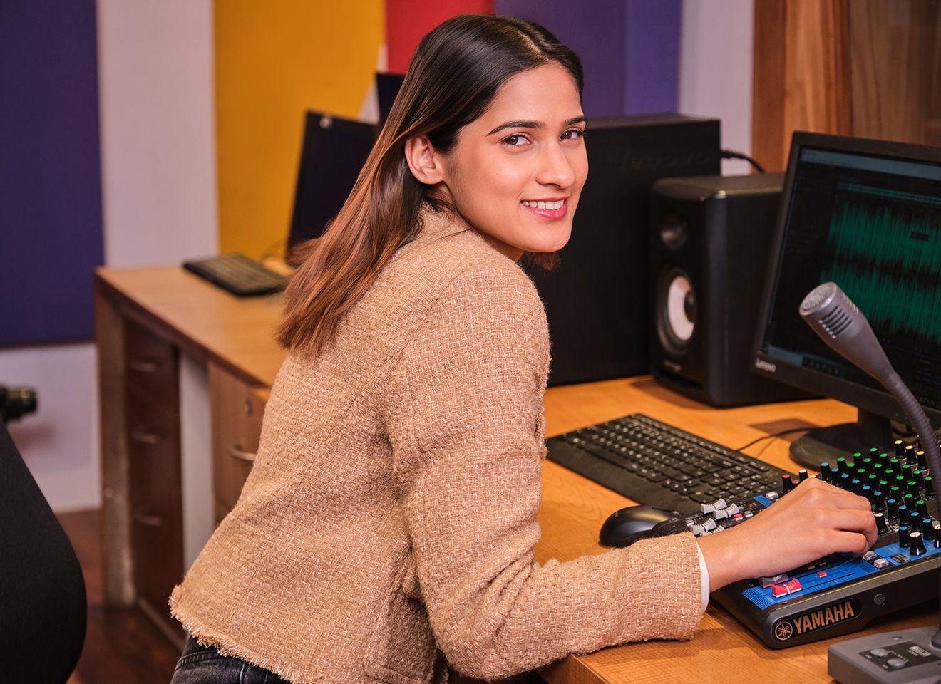 BJMC students working on real-world media projects and production studios at K.R. Mangalam University