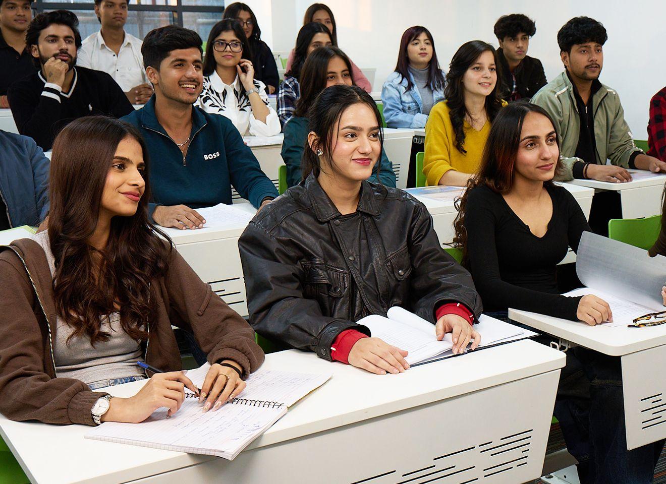 B.Sc. Maths students in a competitive exam coaching session for Banking, SSC, Railways, and Insurance at KRMU