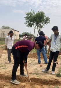 Students working at the KRMU construction yard