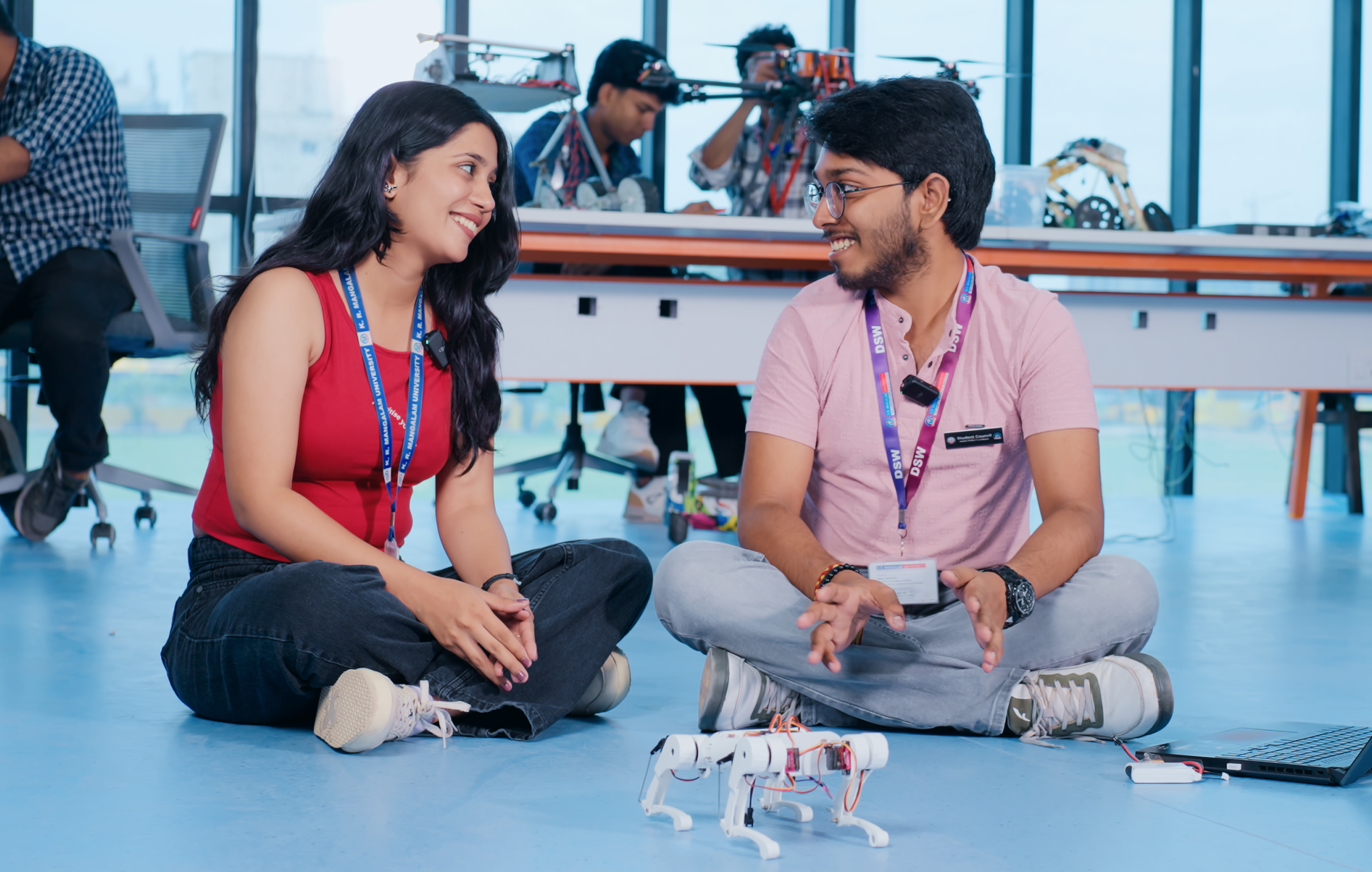 Students working with quadruped robotics in KRMU advanced robotics lab