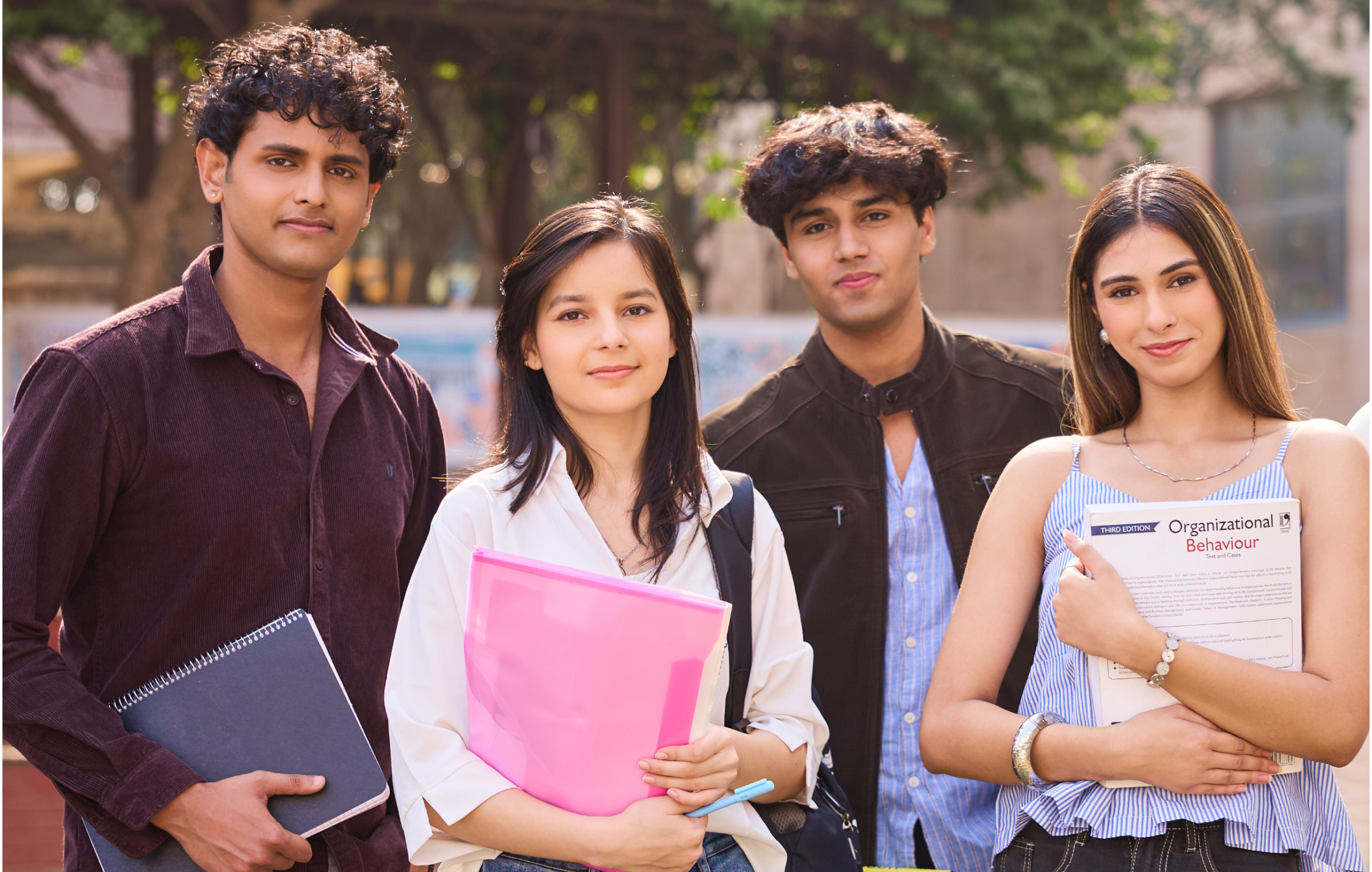 Diverse students engaging in campus life and peer learning at KRMU