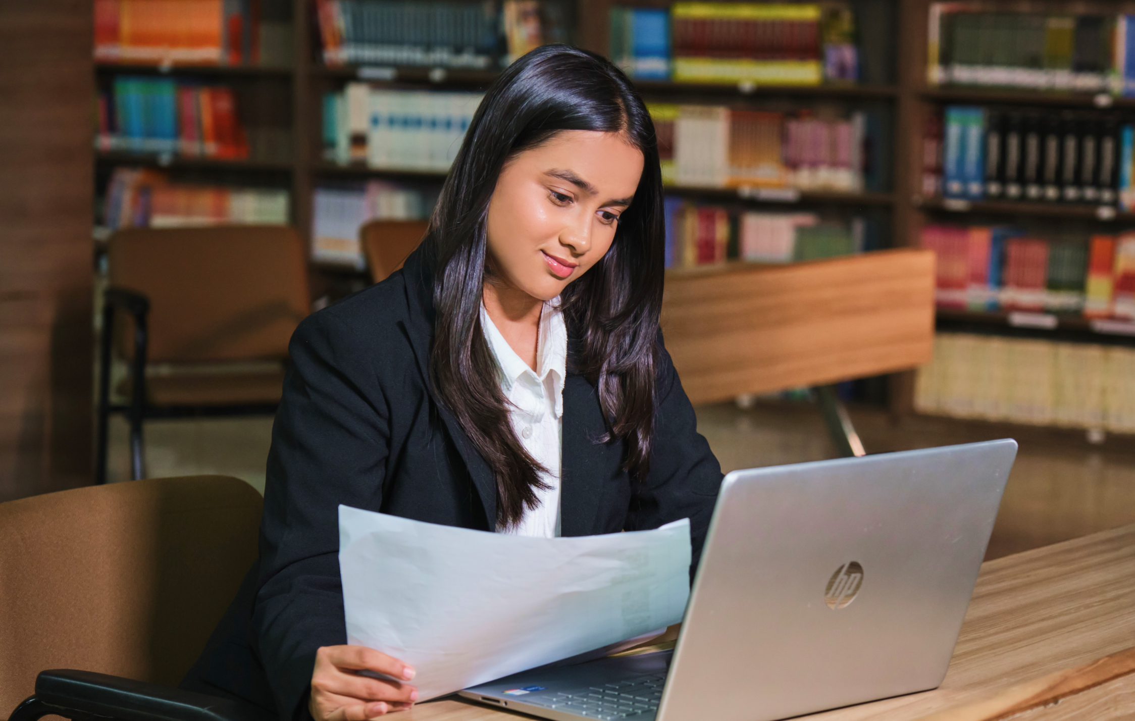 Student researching in the modern KRMU central library